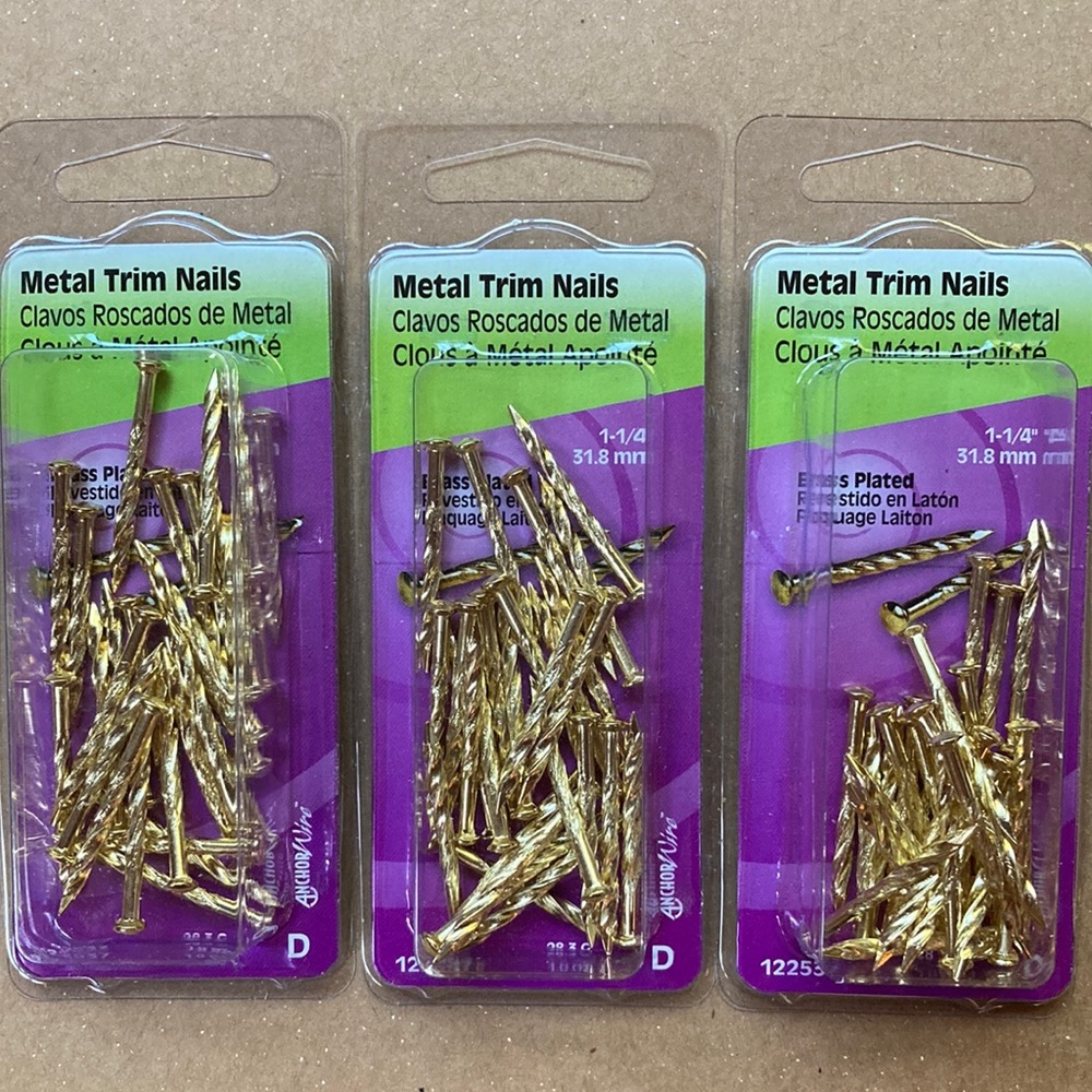 Brass plated metal trim nails